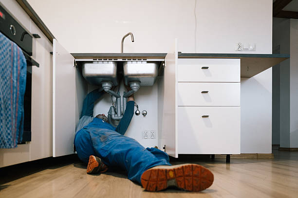 Professional Drain Cleaning technician working in Little Falls, MN